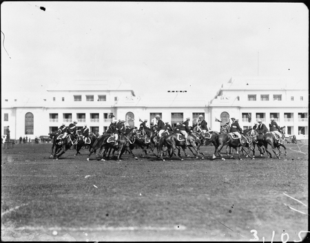 Royal Visit, May 1927. Mounted police practising riding evolutions in Parkes Place.