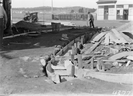 Laying a driveway for a Garage in Mort Street Braddon. Canberra Times Office and Post Office in background.