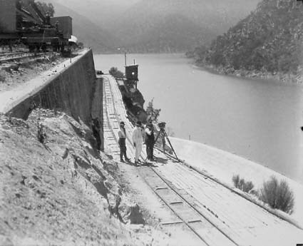 Burrinjuck Dam under construction -movie cameramen on the upstream part of dam