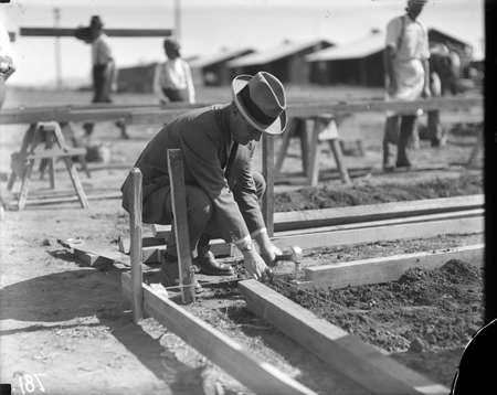 Causeway Hall. Sir John Butters driving first nail.