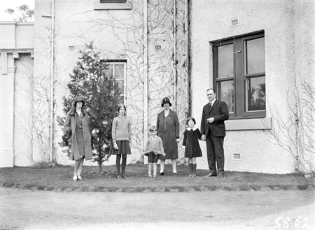 Sir John Butters and family outside Canberra House, Acton.