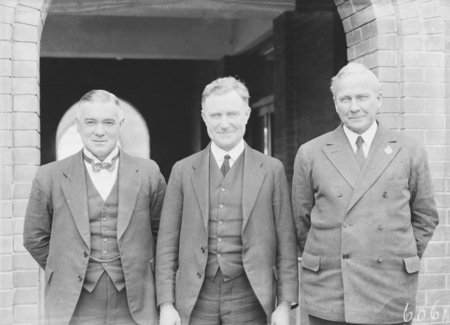 Left to right, Hon C.W.C. Marr, Sir Earle Page MHR, Commonwealth Treasurer, Sir Neville Howse, VC, MHR, Minister for Defence.