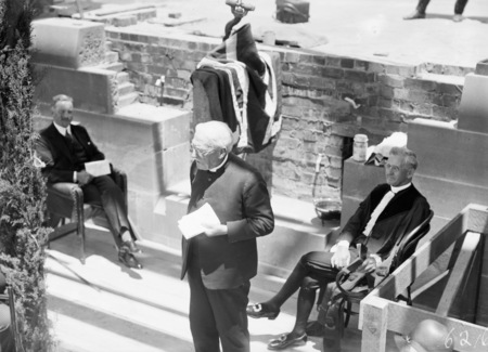 Minister for Canberra, The Very Reverand John Walker, speaking before the congregation and the Govenor General, Lord Stonehaven and Moderator General, The Right Rev. Alexander Ross, at the Foundation Stone laying ceremony at Presbyterian Church of St Andrew, State Circle, Forrest.