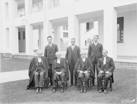 A group of Parliament House officials. Frank Green on the left.