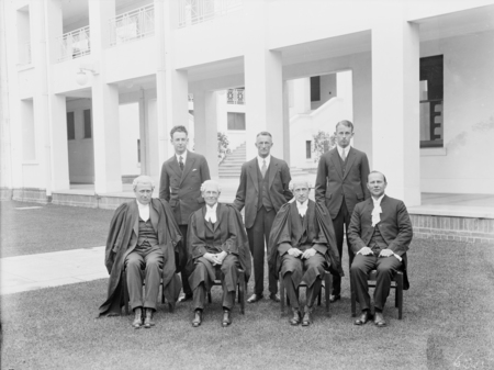 A group of Parliament House officials. Frank Green on the left.
