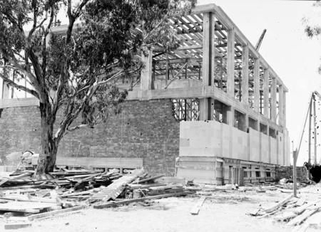Australian Institute of Anatomy under construction. Fitting the sandstone finish. McCoy Circle, Acton