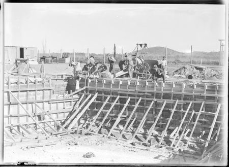 Manuka swimming pool, under construction, pouring concrete for the walls, Manuka Circle, Kingston.