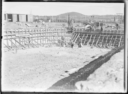 Manuka swimming pool, under construction, pouring concrete for the walls, Manuka Circle, Kingston.