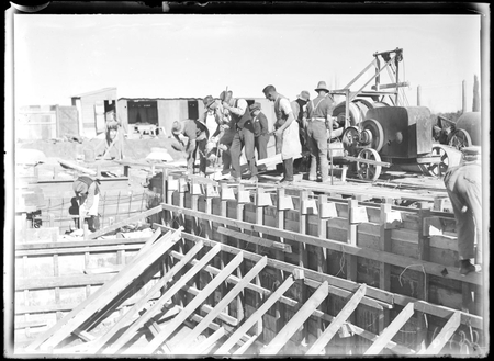 Manuka swimming pool, under construction, pouring concrete for the walls, Manuka Circle, Kingston.