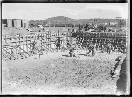 Manuka swimming pool, under construction, pouring concrete for the walls, Manuka Circle, Kingston.
