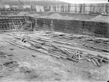 Manuka swimming pool under construction. Wall reinforcement being installed. Manuka Circle, Kingston.