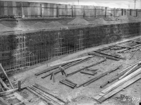 Manuka swimming pool under construction. Wall reinforcement being installed, Manuka Circle, Kingston.