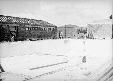 Manuka swimming pool under construction. Tiling now complete. Manuka Circle, Kingston.