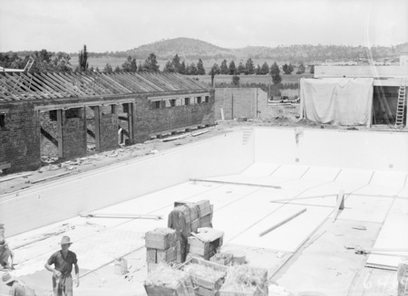 Manuka swimming pool under construction, tiling of the floor, Manuka Circle, Kingston.
