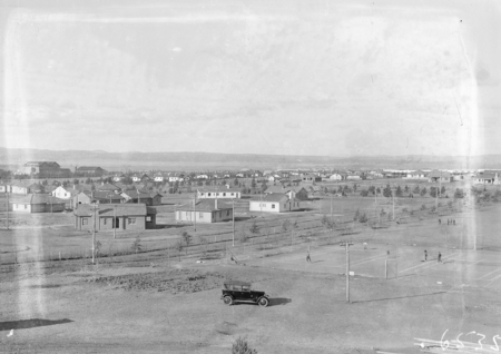 Kingston from Telopea Park School. Kingston Power Station on the left, tennis courts in foreground.