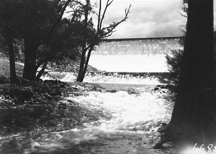 Cotter Dam Wall and overflow from the stilling pond