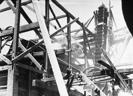 Stone crushing plant at Mugga Quarry. drive belts and bucket elevator