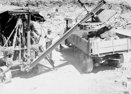 Steam shovel loading motor truck. Excavation for Black Mountain reservoir.