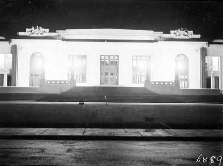 Front of Parliament House by night.