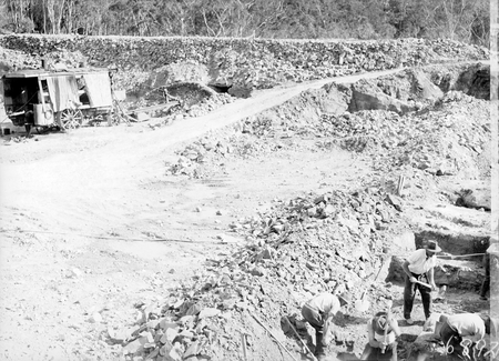 Workmen excavating the Black Mountain reservoir. Keystone steam excavator at the rear.