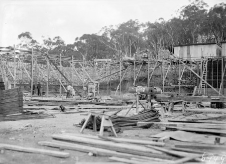 Excavation for Black Mountain reservoir showing steel reinforcement and concrete form work.