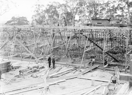 Excavation for Black Mountain reservoir showing steel reinforcement and concrete form work.