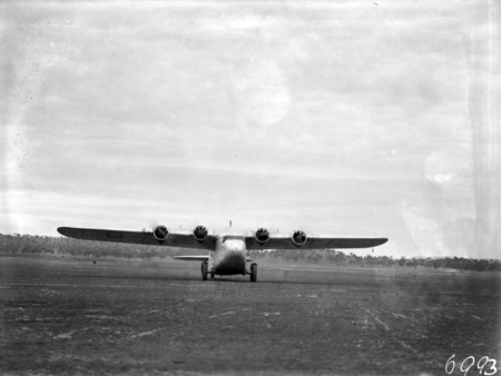 Visit of Imperial Airways Airliner ASTRAEA on a survey flight for proposed air mail service. Aircraft taxing on Duntroon landing ground. Aircraft weighs 10 tons laden, holds 17 passengers, 14 feet high, wing span 90 feet, 71.5 feet long, is a high wing unbraced monoplane with four Armstrong Siddeley double Mongoose air cooled radial engines of 340 horse power. Cruising speed is 118 MPH and maximum speed of 150 MPH and has a fuel range for 7 hours at full load.