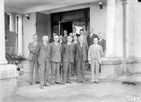 Group in front of Ainslie Hotel portico included Eric Crisp and Alan Wingfield. Public Service Board?