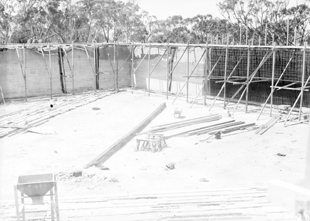 Black Mountain Reservoir, under construction. Form work and reinforcement for concreting.