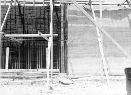 Black Mountain Reservoir. Form work and part of the concrete wall after the form has been stripped.