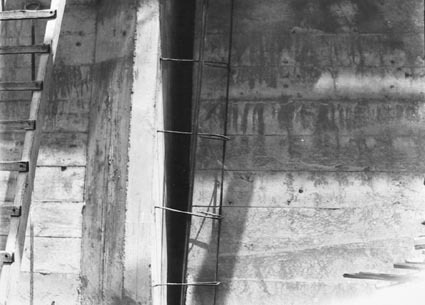 Black Mountain Reservoir. Part of the concrete wall after the form has been stripped