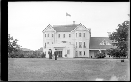 Govenor General Sir Isaac and Lady Isaacs at Government House private entrance, Yarralumla.
