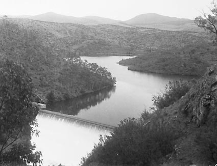 Cotter Dam upstream from dam wall.Spillway overflowing