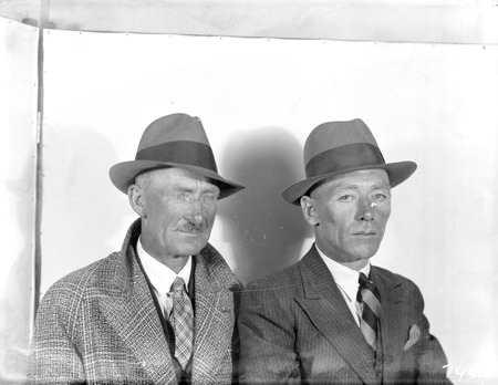 Two unidentified men.