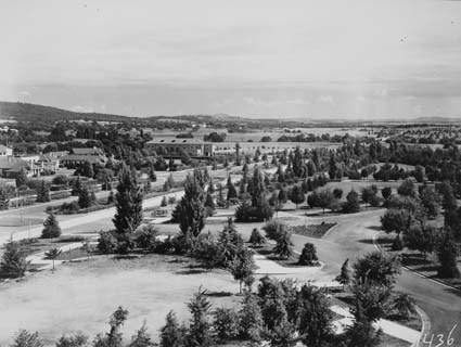Canberra Hotel on the left,Commonwealth Avenue and Albert Hall from West Block. Well devoloped gardens in front