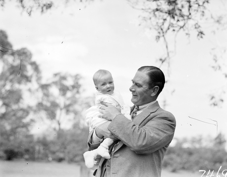 Sir John Butters with one of his family.