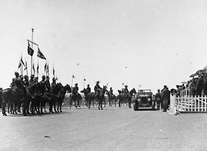 Armistice Day -Arrival of the Governor General, Lord Stonehaven in car with Light Horse escort in front of Parliament House