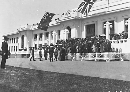 Armistice Day - Official Party entering Parliament House steps with  Spectators