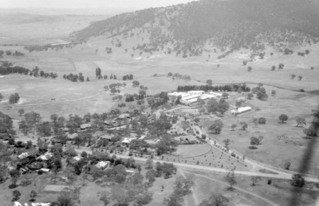 Arial view. Canberra Community Hospital and Acton from the air. Black Mountain in background.