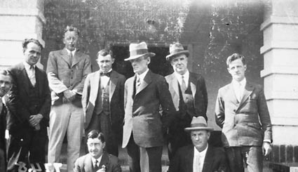 Commonwealth Avenue footpath and rose gardens outside Hotel Canberra, looking south